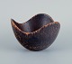 Gunnar Nylund (1904–1997) for Rörstrand. Ceramic bowl, organic shape with dark 
brown and orange glaze.