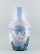 L'Art presents: 
Arthur 
Boesen for 
Royal 
Copenhagen, 
colossal unique 
porcelain vase.
Hand painted 
with motif ...