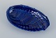 Wilhelm Kåge for Gustavsberg, Sweden, large snail-shaped ceramic bowl in dark 
blue.