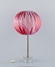 Josef Frank, stor bordlampe i glas og messing. Skærm i tekstil med rosa  nuancer 
med blomstermotiver.