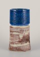 Sylvia Leuchvius for Rörstrand, Sweden. Ceramic vase with glaze in blue and 
sandy tones.