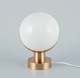 Vilhelm Lauritzen (1894-1984). Wall lamp/table lamp made of brass and opal 
glass. Large model.