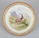 Royal Copenhagen Fauna Danica dinner plate with a motif of an ibex in a 
landscape. Hand-painted.
