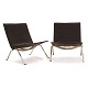 Aabenraa 
Antikvitetshandel 
presents: 
Pair of 
Poul Kjærholm 
PK22 lounge 
chairs with 
black leather 
and steel frame