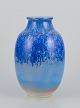 Sevres, France. Large unique porcelain vase with crystal glaze in blue shades.