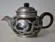 Chinese 
stoneware 
teapot with 
pewter 
mounting, 
approx. 1930