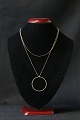 Antik Huset 
presents: 
Necklace 
in gold-plated 
925 sterling 
silver, with a 
nice circular 
pendant.