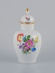 L'Art presents: 
Meissen, 
low vase in 
porcelain. 
Polychrome 
flower motifs 
in overglaze.