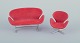 L'Art presents: 
Arne 
Jacobsen, 
miniatures of 
the "Swan" 
chair and sofa 
in red fabric.