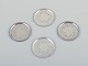 L'Art presents: 
Georg 
Jensen, a set 
of four glass 
coasters in 
sterling 
silver.