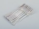 L'Art presents: 
Cohr, 
Danish 
silversmith. 
"Old Danish". 
Eight cake 
forks in 830 
silver.