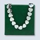 Antik 
Damgaard-
Lauritsen 
presents: 
Hans 
Hansen; A heart 
necklace of 
sterling silver 
#302