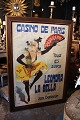 K&Co. presents: 
Antique 
French 
hand-painted 
advertising 
poster on 
canvas with a 
very fine 
patina from 
around ...