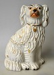 Pegasus – Kunst 
- Antik - 
Design 
presents: 
Staffordshire 
dog figure, 
earthenware, 
19th century 
England.