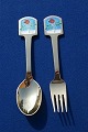 Antikkram 
presents: 
Michelsen 
Set Christmas 
spoon and fork 
1977 of Danish 
gilt sterling 
silver