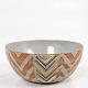 Roxy Klassik 
presents: 
Eva Brandt
Stoneware bowl 
with line decor 
in earthy 
colours. 
Signed. 
Provenance: ...