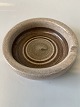 Ashtray with beautiful ceramic glaze
Diameter 8 cm.