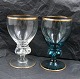 Antikkram 
presents: 
Gisselfeld 
with gold rim. 
White wine 
glasses, green 
and clear, 11cm