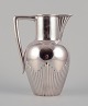 L'Art presents: 
P. Hertz, 
Danish 
silversmith.
Large Art 
Nouveau pitcher 
in 830 silver.