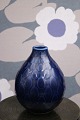 K&Co. presents: 
Fine, 
small ceramic 
vase from 
Aluminia - 
Marselis in 
dark blue 
glaze...