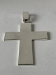 Antik Huset 
presents: 
Large 
Cross Pendant 
in Silver
Stamped. 925S 
DAM
Length with 
eaves . 10.0 cm