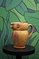 K&Co. presents: 
Antique 
"Lillerød" owl 
jug in glazed 
earthenware 
from around 
1900...