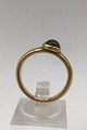 Danam Antik 
presents: 
Georg 
Jensen 18 ct 
Gold Ring David 
Chu Moonrise 
Peridot