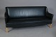 Roxy Klassik presents: Einar Larsen & Bendner Madsen.3-seater sofa.Black leather.Re-upholstered a few ...