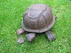 Turtle carved in oak. Opens when you step on the head. Possibly meant to hide the spittoon. ...