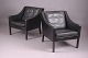 Roxy Klassik presents: Børge Mogensen / Fredericia Furniture.A pair of Lounge chairs.Dark stained wood & ...
