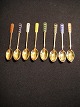24 karat gold-plated spoon with enamel. 925 sterling silver (ella) 8 pieces Total weight ...
