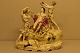 L Art presents: Monumental Royal Copenhagen antique porcelain figure group.