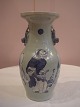 Atelier 4 Roses presents: Antique chinese vase with sage and dragons.