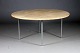 Round dinning
table in solid
ash.
Legs in chrome
plated ...