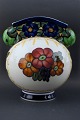 Aluminia
faience vase,
modeled with
apples and hand
...