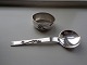 Jam spoon.
Napkin ring .