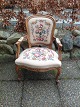 Rococo chair.
with
embroidered
upholstery
Traces ...