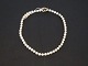 Pearl necklace
by R. Svart
with closure in
gold (white ...