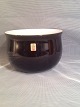 Holmegård
flowerpot.
White opal
glass interior
with ...