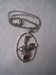 Necklace in
silver. Chain
L. 30 cm.