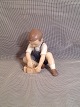 Figurines.
Boy playing
with building
blocks.
Bing ...
