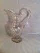 Milk jug on
Ringfod.krop
with
olivslibninger
and neck ...