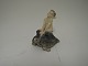 Royal
Copenhagen.
Faun on
tortoise