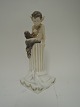 Royal
Copenhagen.
Faun with
rabbit