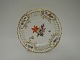 Royal
Copenhagen.
Saxon flower.
Plate with lace
trim.