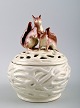 Rorstrand Art
Nouveau
porcelain
lidded vase,
lid with ... Rorstrand Art
Nouveau
porcelain
lidded vase,
lid with ...