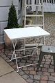 Old French
metal table
with old white
color. Old French
metal table
with old white
color.