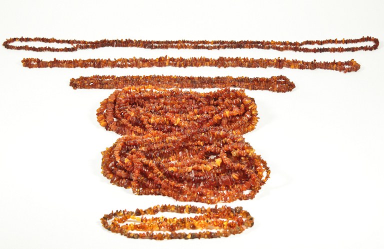 Large collection of Danish amber necklaces in different sizes. 
