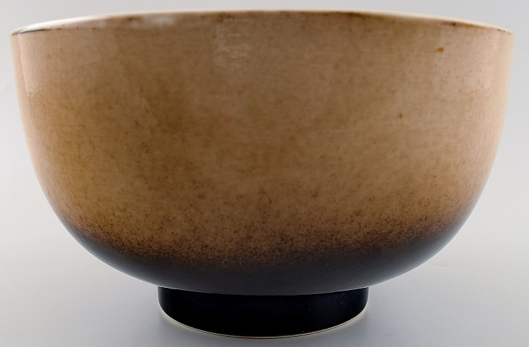 Unique Royal Copenhagen large ceramic bowl by Nils Thorsson.
