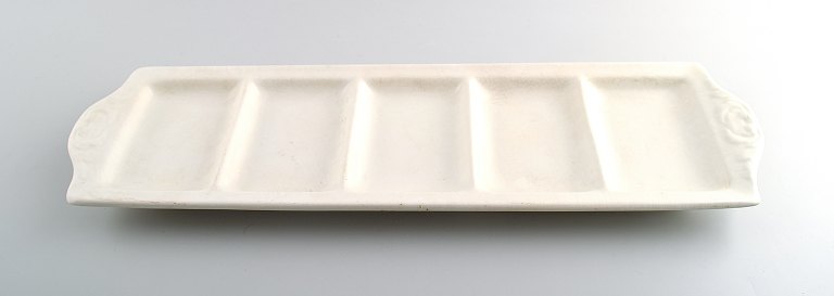 Large Rörstrand "Perl" cabaret dish in white earthenware.
